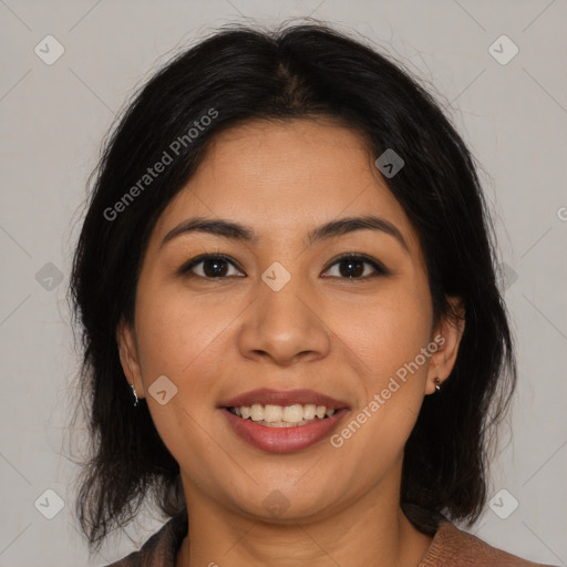 Joyful latino young-adult female with medium  brown hair and brown eyes