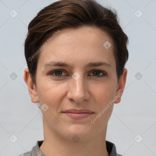 Joyful white young-adult female with short  brown hair and grey eyes