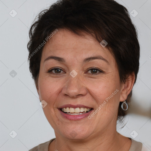 Joyful white adult female with short  brown hair and brown eyes