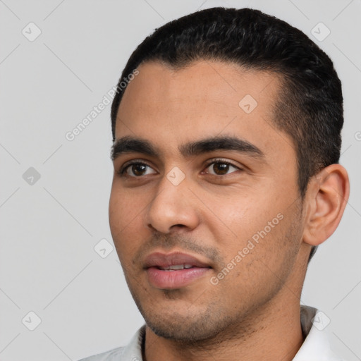 Neutral latino young-adult male with short  black hair and brown eyes