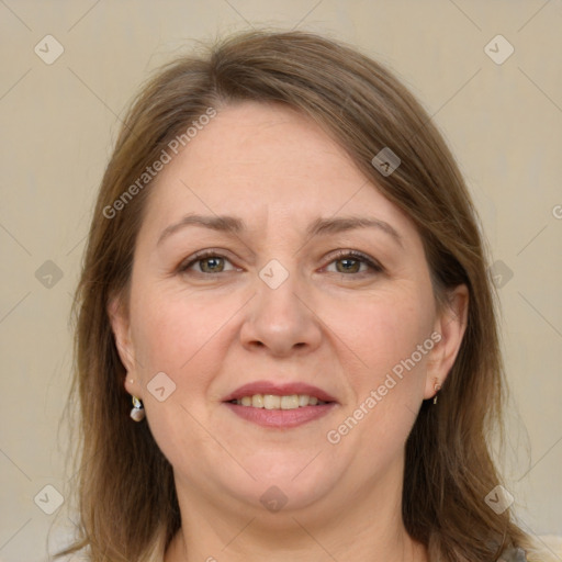 Joyful white adult female with medium  brown hair and grey eyes