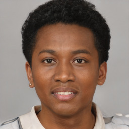 Joyful latino young-adult male with short  brown hair and brown eyes