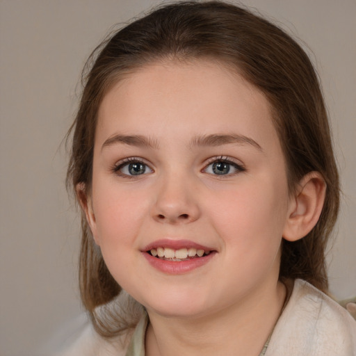 Joyful white child female with medium  brown hair and brown eyes