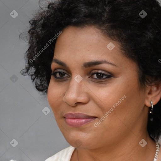 Joyful latino young-adult female with medium  black hair and brown eyes