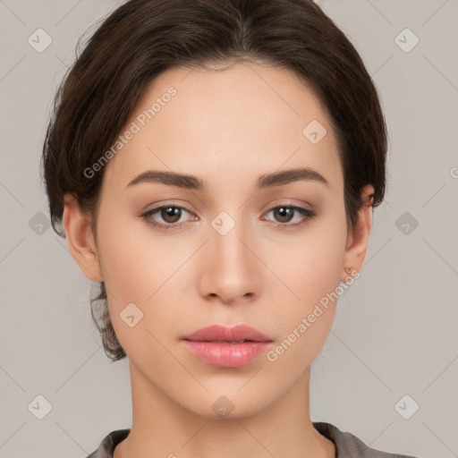 Neutral white young-adult female with short  brown hair and brown eyes