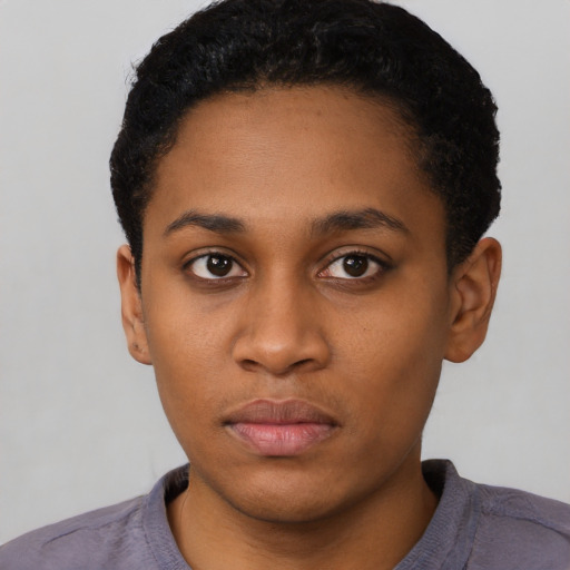 Neutral black young-adult female with short  black hair and brown eyes
