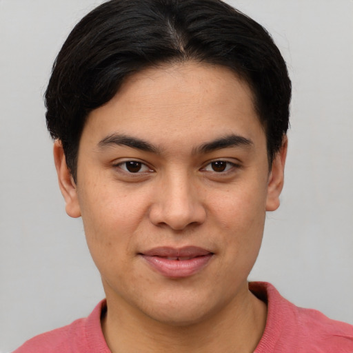 Joyful asian young-adult female with short  brown hair and brown eyes