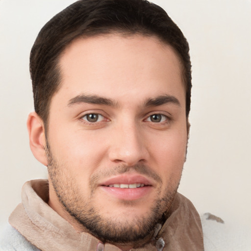 Joyful white young-adult male with short  brown hair and brown eyes