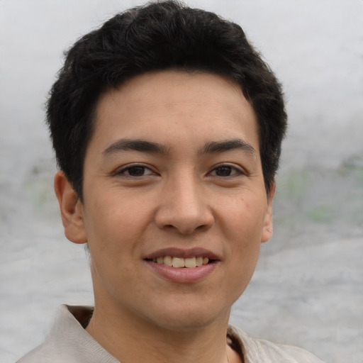 Joyful asian young-adult male with short  brown hair and brown eyes