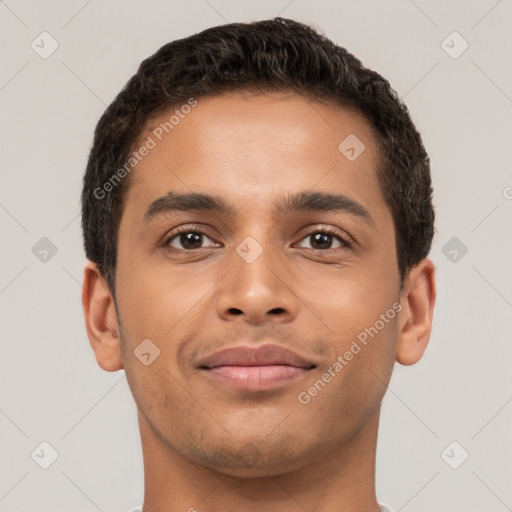 Joyful latino young-adult male with short  brown hair and brown eyes