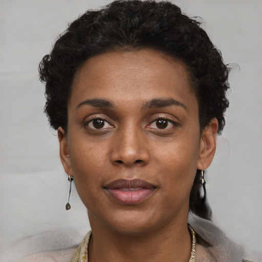 Neutral black young-adult female with short  black hair and brown eyes