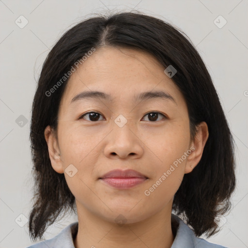 Neutral asian young-adult female with medium  brown hair and brown eyes