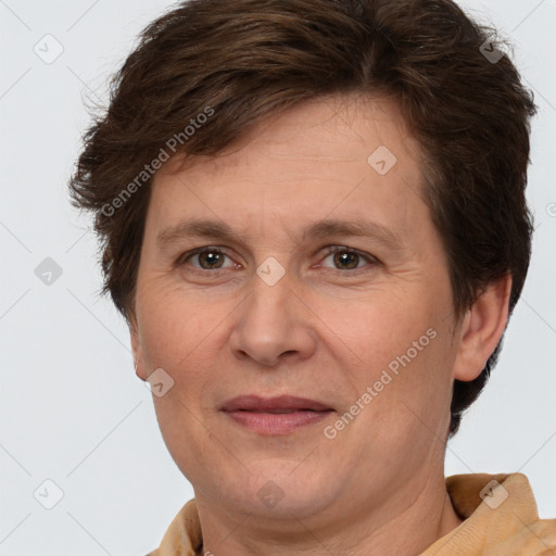 Joyful white adult female with short  brown hair and brown eyes