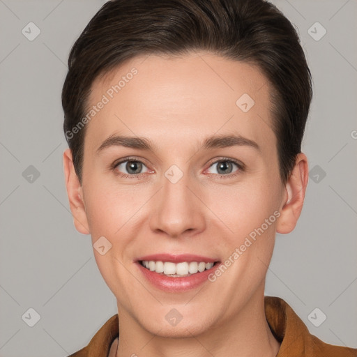 Joyful white young-adult female with short  brown hair and grey eyes