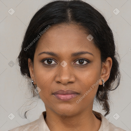 Joyful black young-adult female with medium  brown hair and brown eyes