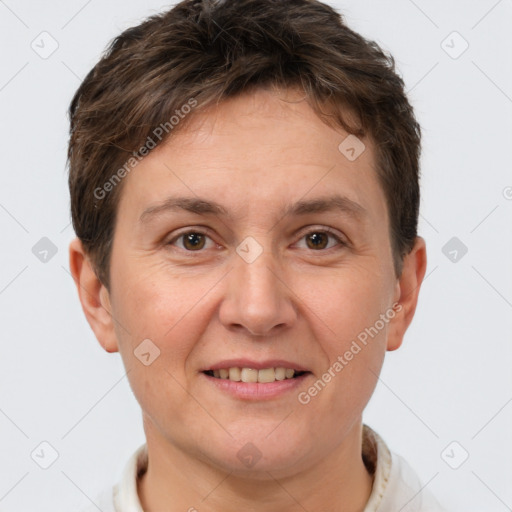 Joyful white adult female with short  brown hair and brown eyes