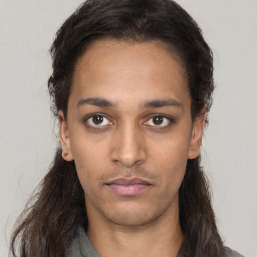 Neutral latino young-adult female with long  brown hair and brown eyes