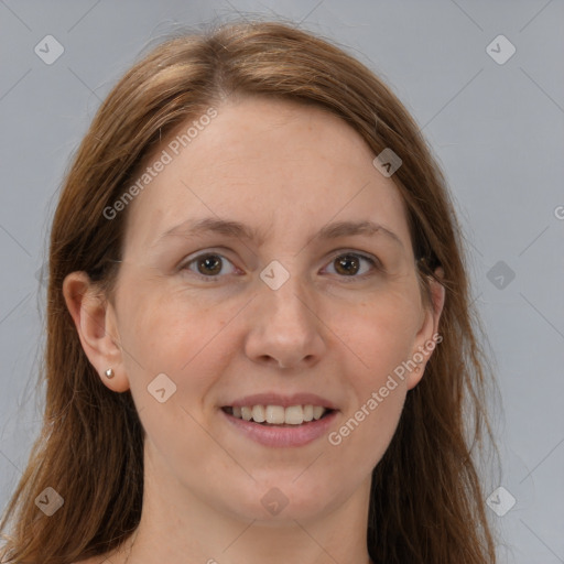 Joyful white adult female with long  brown hair and grey eyes