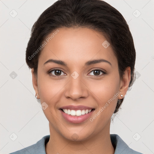 Joyful white young-adult female with short  brown hair and brown eyes