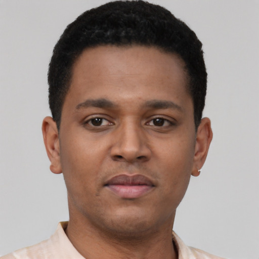Neutral latino young-adult male with short  brown hair and brown eyes