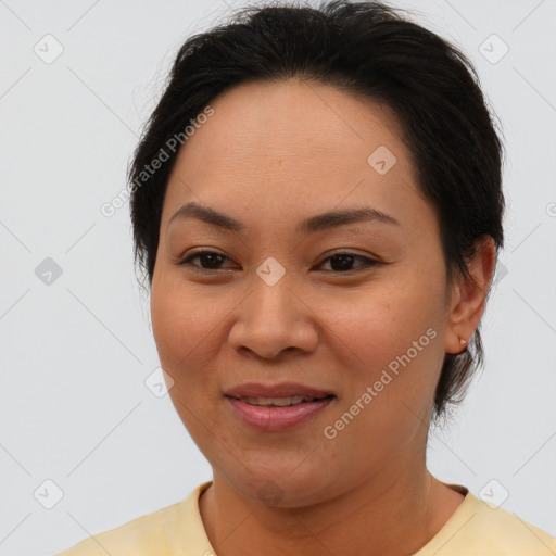 Joyful asian young-adult female with short  brown hair and brown eyes