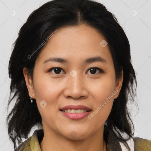 Joyful asian young-adult female with medium  brown hair and brown eyes