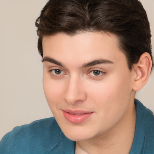 Joyful white young-adult male with medium  brown hair and brown eyes