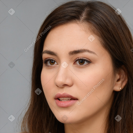 Neutral white young-adult female with long  brown hair and brown eyes