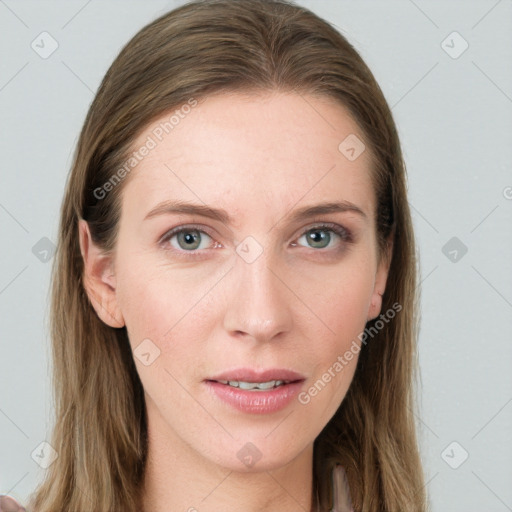 Joyful white young-adult female with long  brown hair and blue eyes