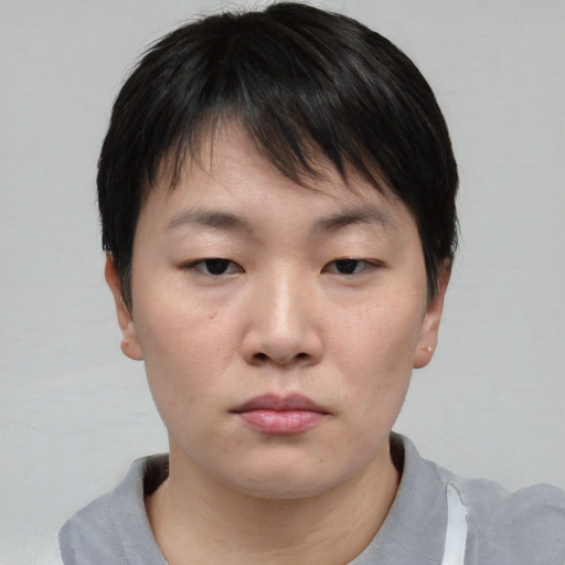 Neutral asian young-adult male with short  brown hair and brown eyes