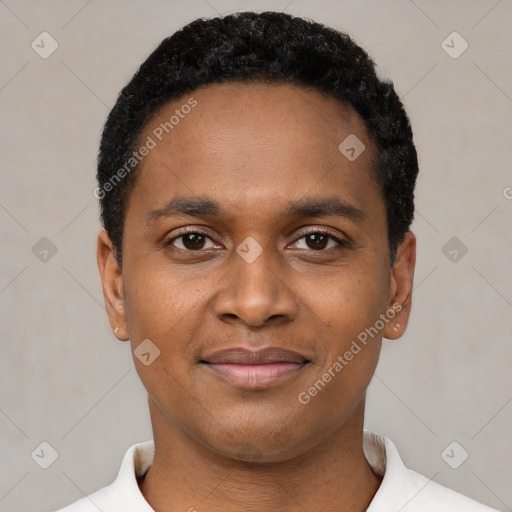 Joyful black young-adult male with short  black hair and brown eyes