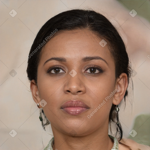 Joyful latino young-adult female with medium  brown hair and brown eyes