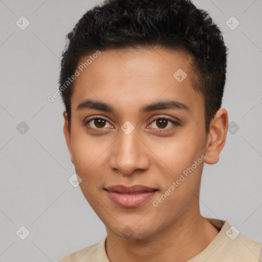 Joyful latino young-adult male with short  brown hair and brown eyes