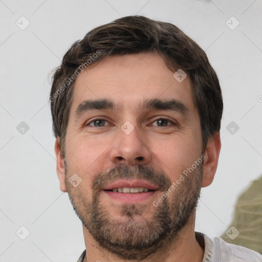 Neutral white adult male with short  brown hair and brown eyes