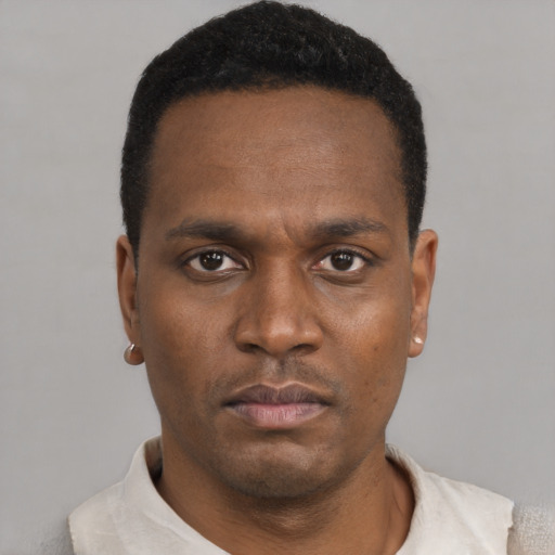 Neutral black young-adult male with short  black hair and brown eyes