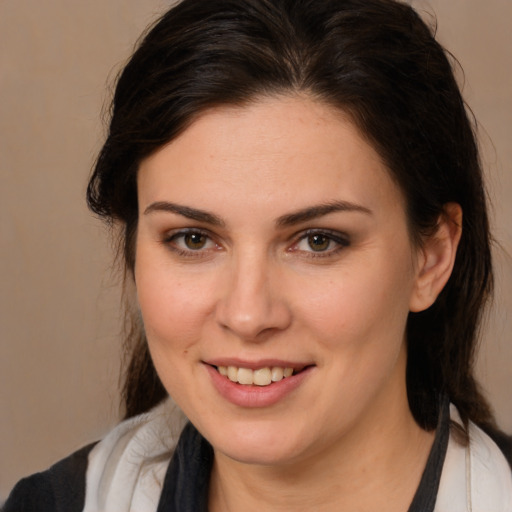 Joyful white young-adult female with medium  brown hair and brown eyes