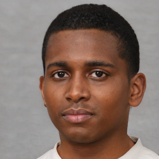 Neutral black young-adult male with short  black hair and brown eyes
