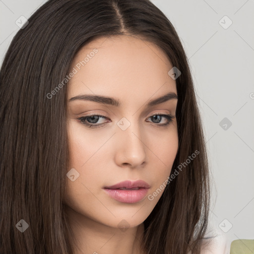 Neutral white young-adult female with long  brown hair and brown eyes