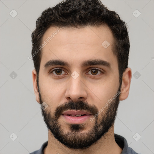 Neutral white young-adult male with short  black hair and brown eyes