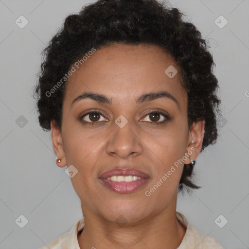 Joyful black young-adult female with short  brown hair and brown eyes