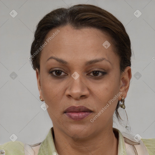 Joyful white adult female with short  brown hair and brown eyes