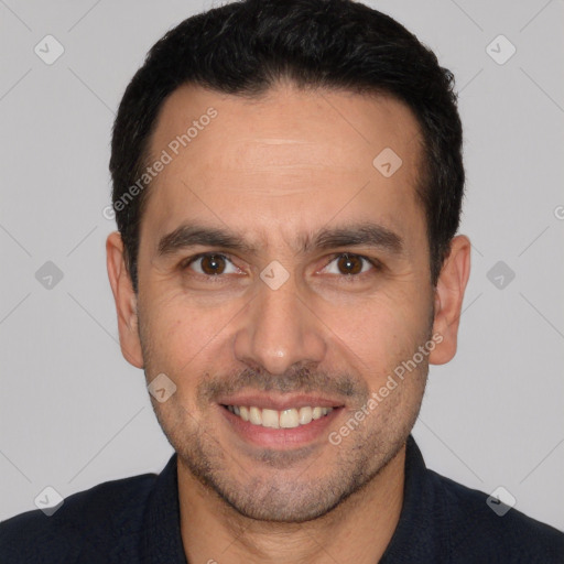 Joyful white young-adult male with short  black hair and brown eyes