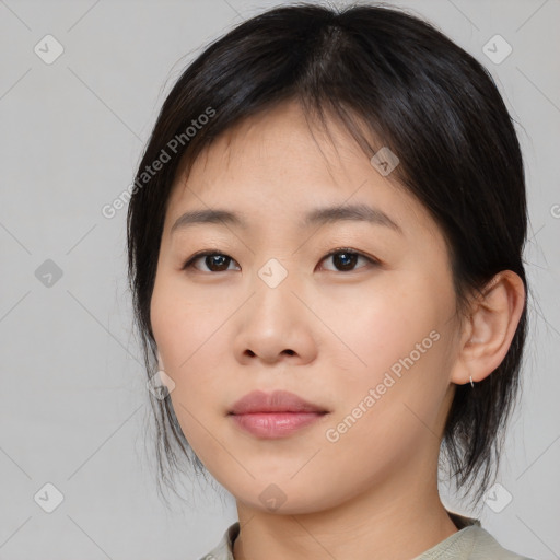 Neutral asian young-adult female with medium  brown hair and brown eyes