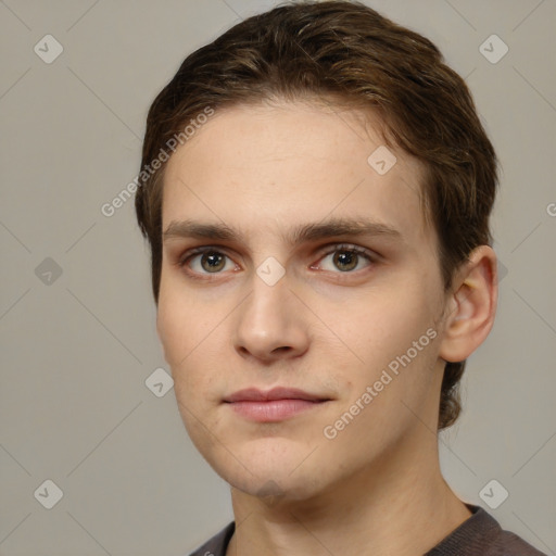 Neutral white young-adult male with short  brown hair and grey eyes