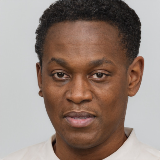 Neutral black adult male with short  black hair and brown eyes