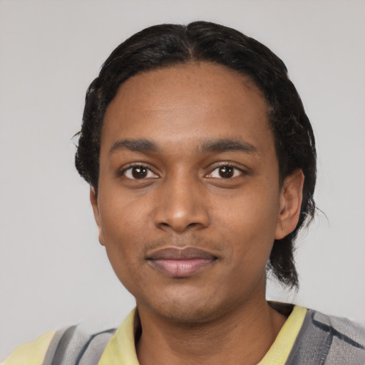 Neutral black young-adult male with short  black hair and brown eyes