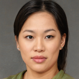 Neutral asian young-adult female with medium  brown hair and brown eyes