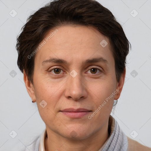 Joyful white adult female with short  brown hair and brown eyes