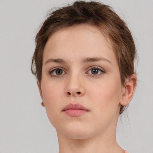 Neutral white young-adult female with short  brown hair and grey eyes