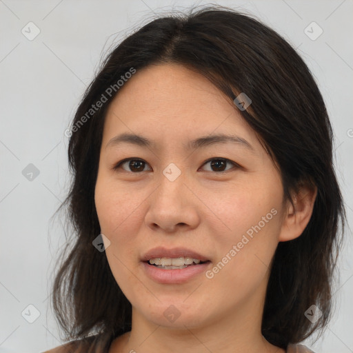 Joyful white young-adult female with medium  brown hair and brown eyes